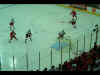 Irbe chases the puck